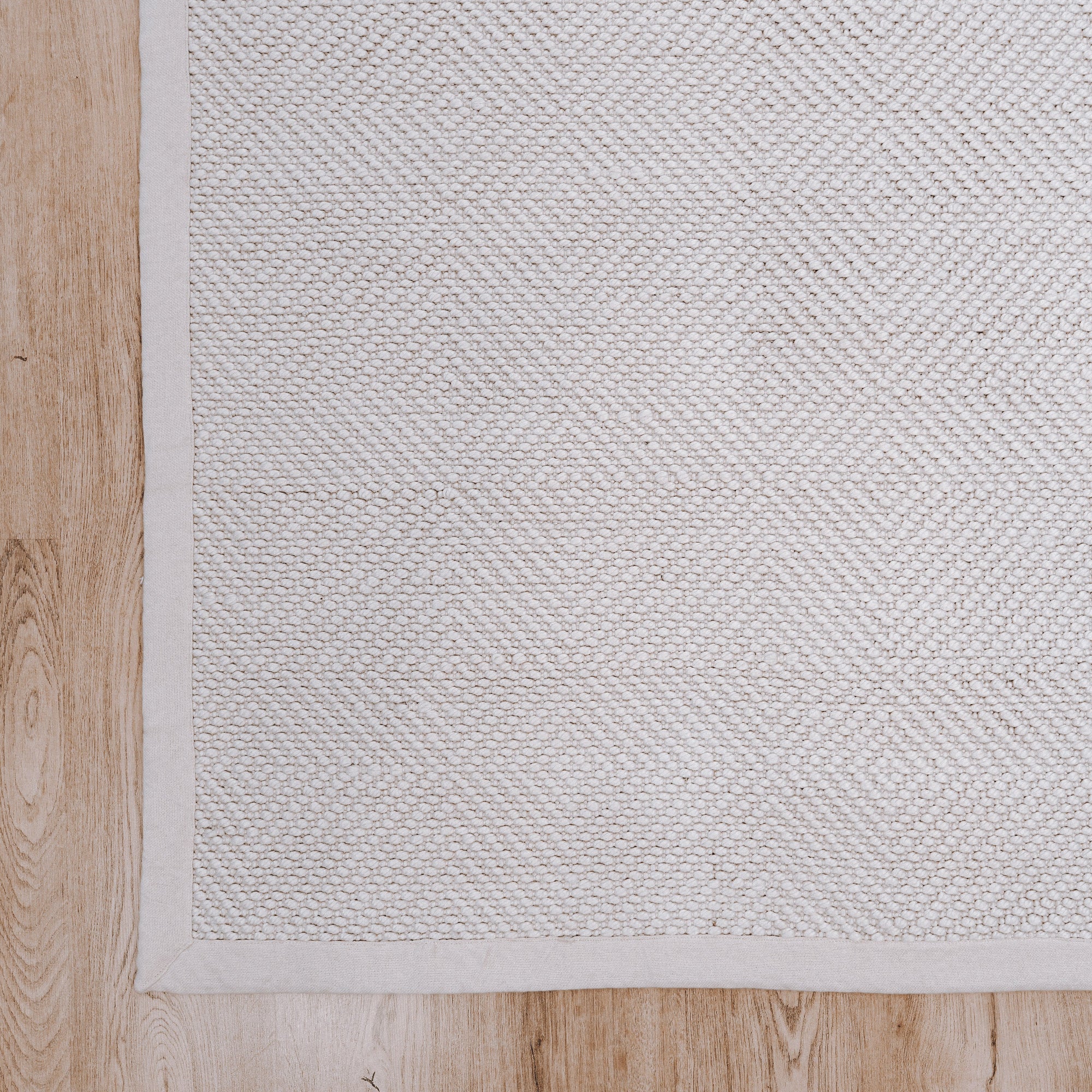 Janna Handwoven Eco-Friendly Floor Rug in Natural Tones