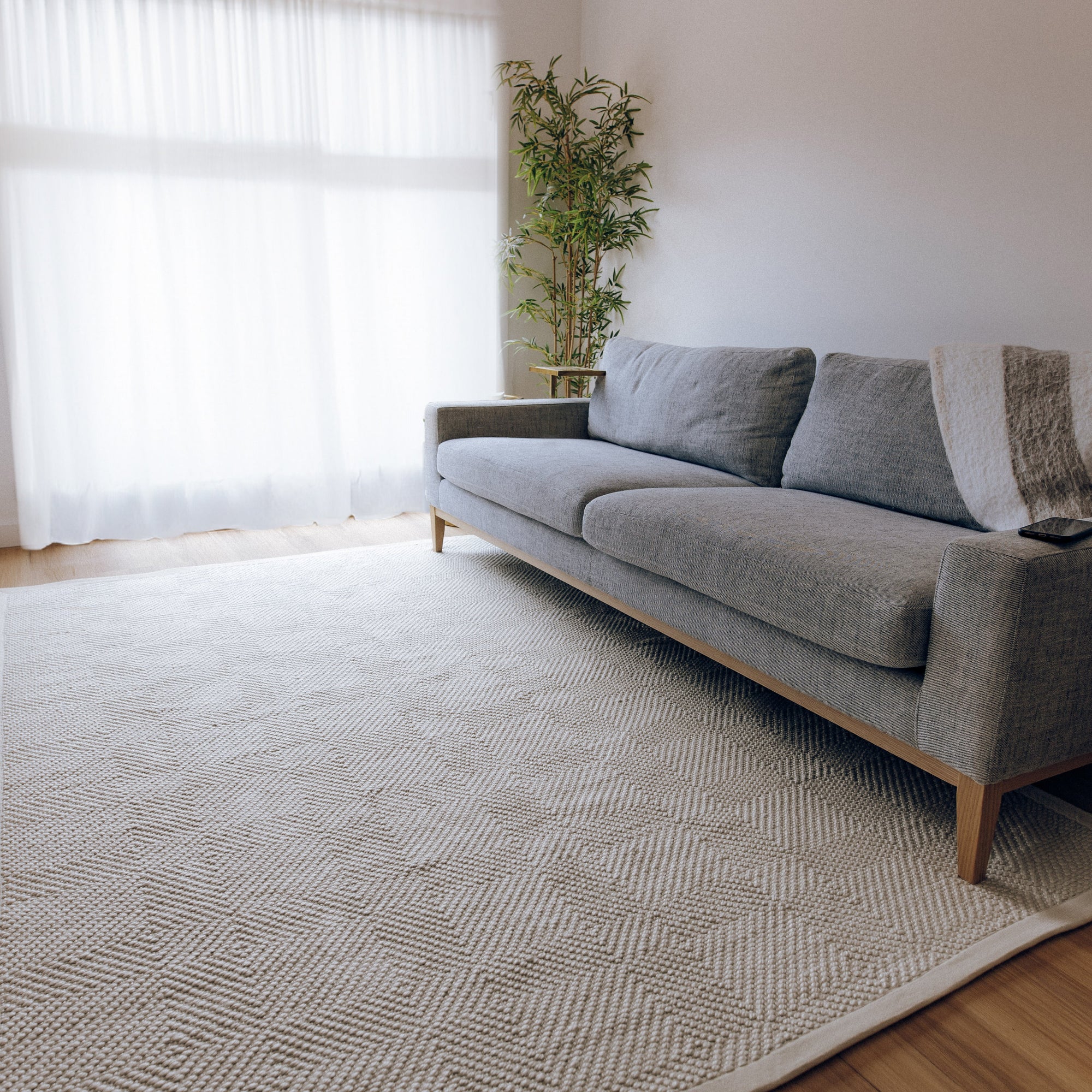 Janna Handwoven Eco-Friendly Floor Rug in Natural Tones