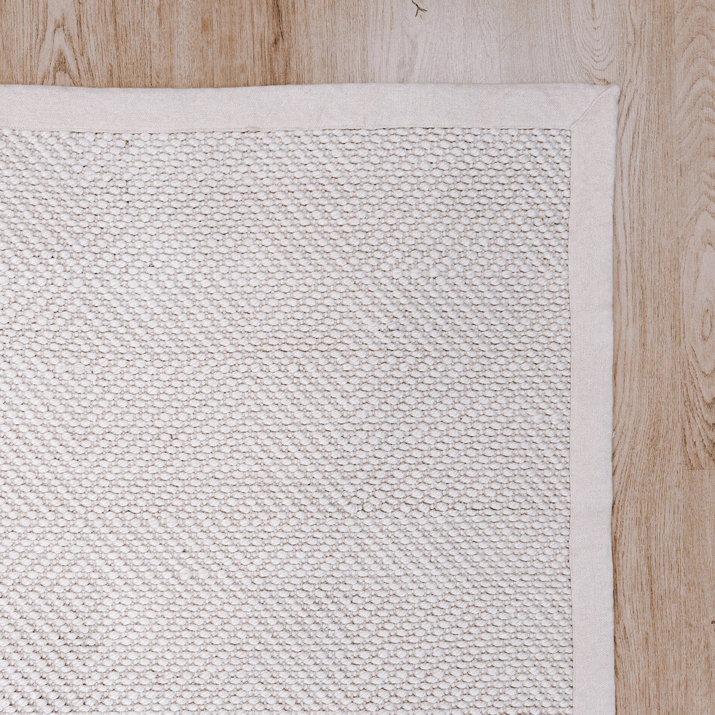 Janna Handwoven Eco-Friendly Floor Rug in Natural Tones