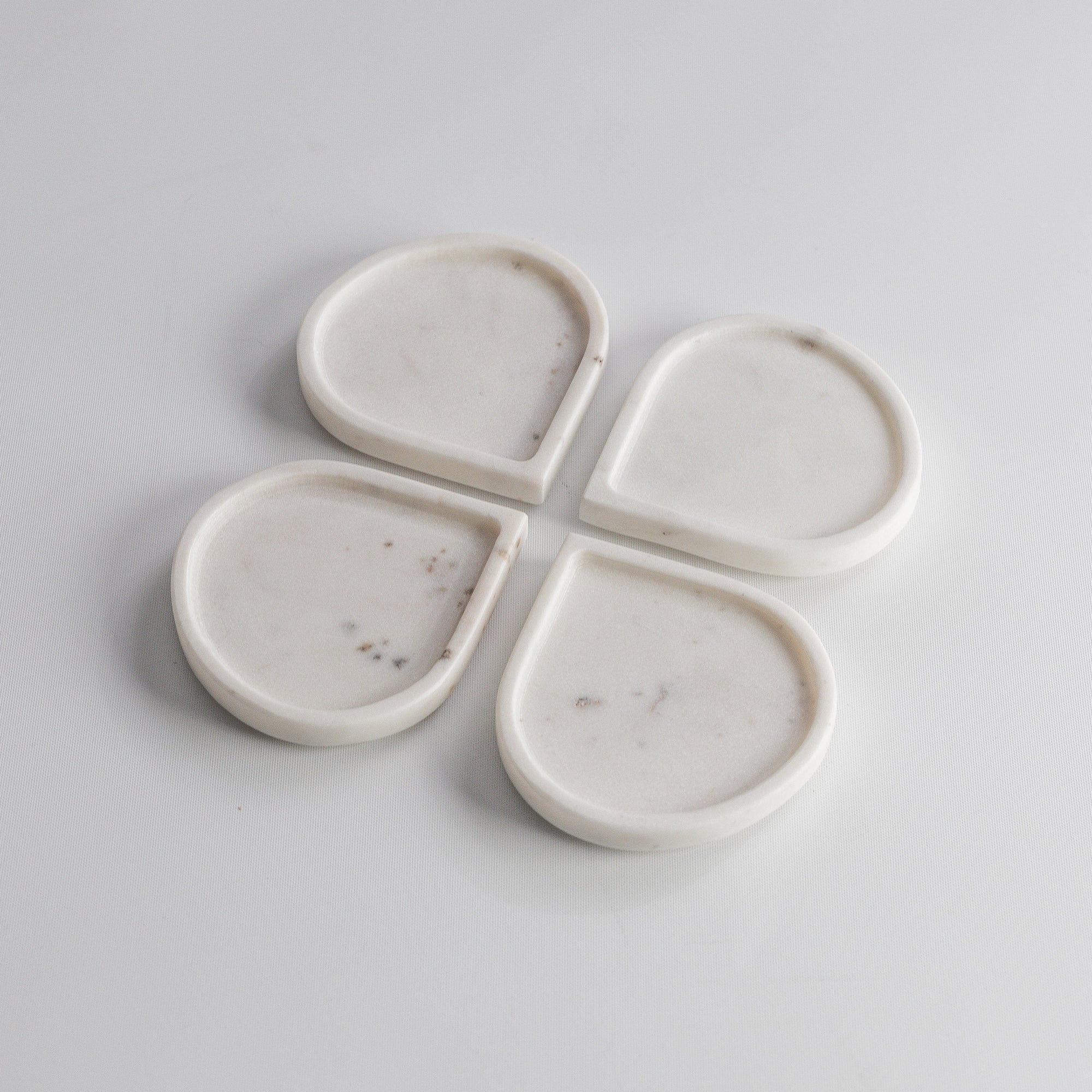Elegant White Marble Raindrop Coaster Set for Stylish Surfaces