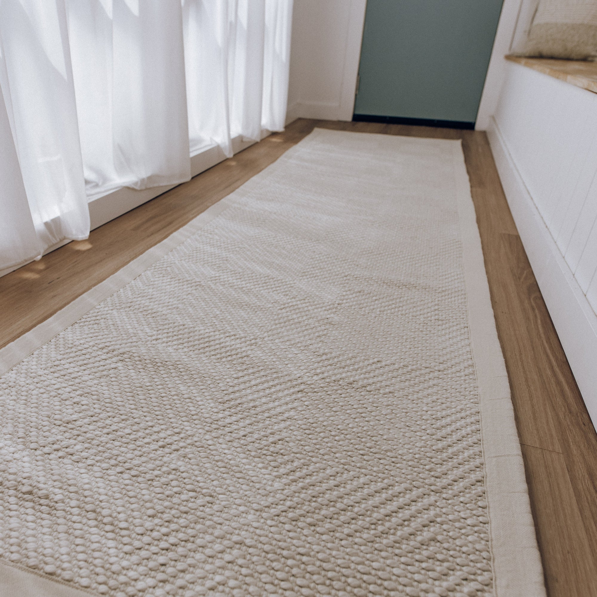 Janna Handwoven Eco-Friendly Floor Rug in Natural Tones