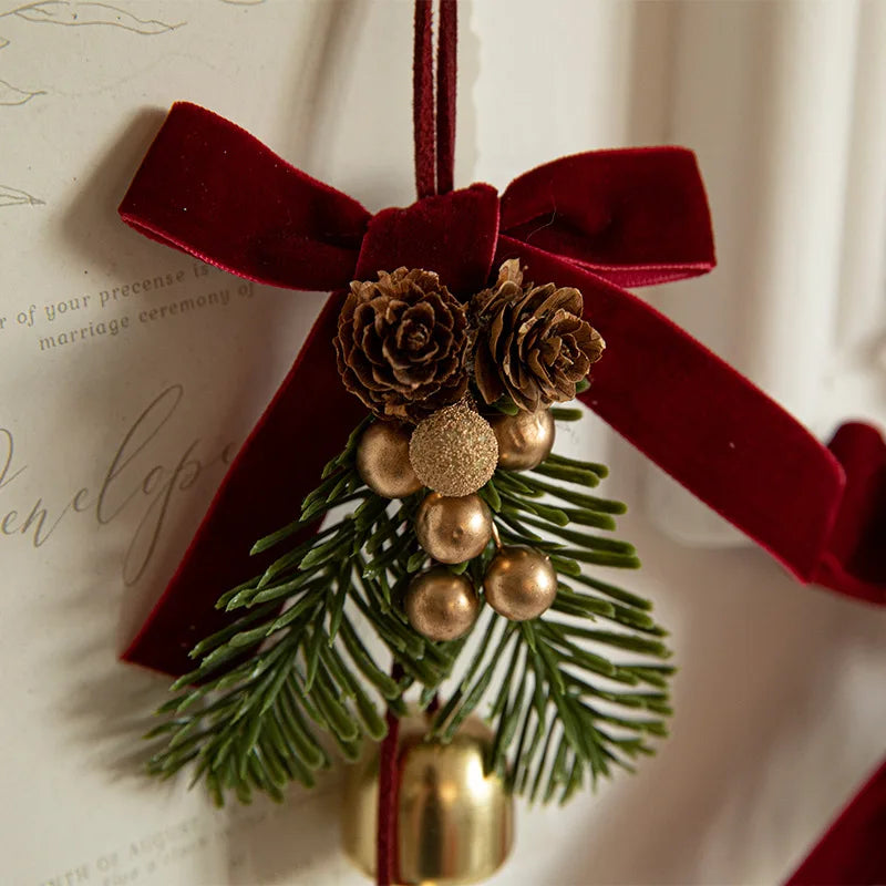 Festive Christmas Jingle Bells Door Hanger with Velvet Bow & Pine Cones