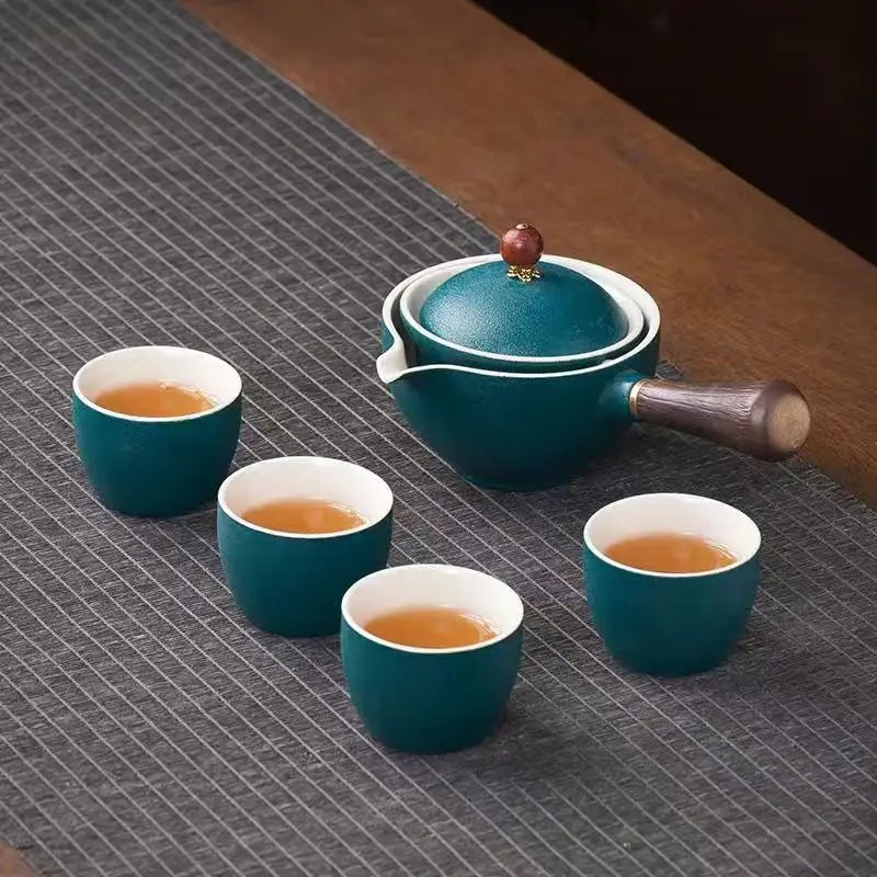 Portable 4-Piece Gongfu Tea Set with Rotating Teapot - Perfect Travel Gift