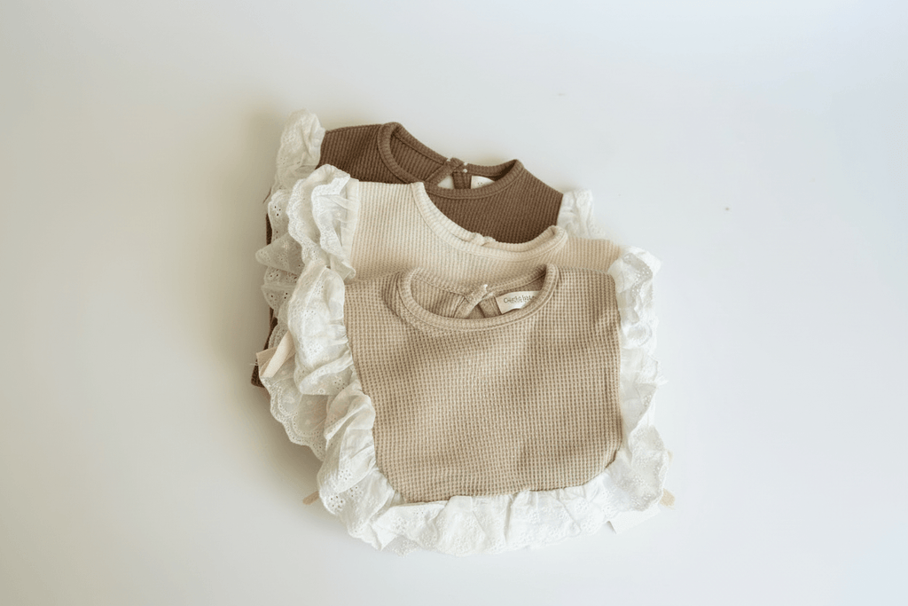 Essentīals Lace Bib - Stylish, Soft, and Practical Baby Bib