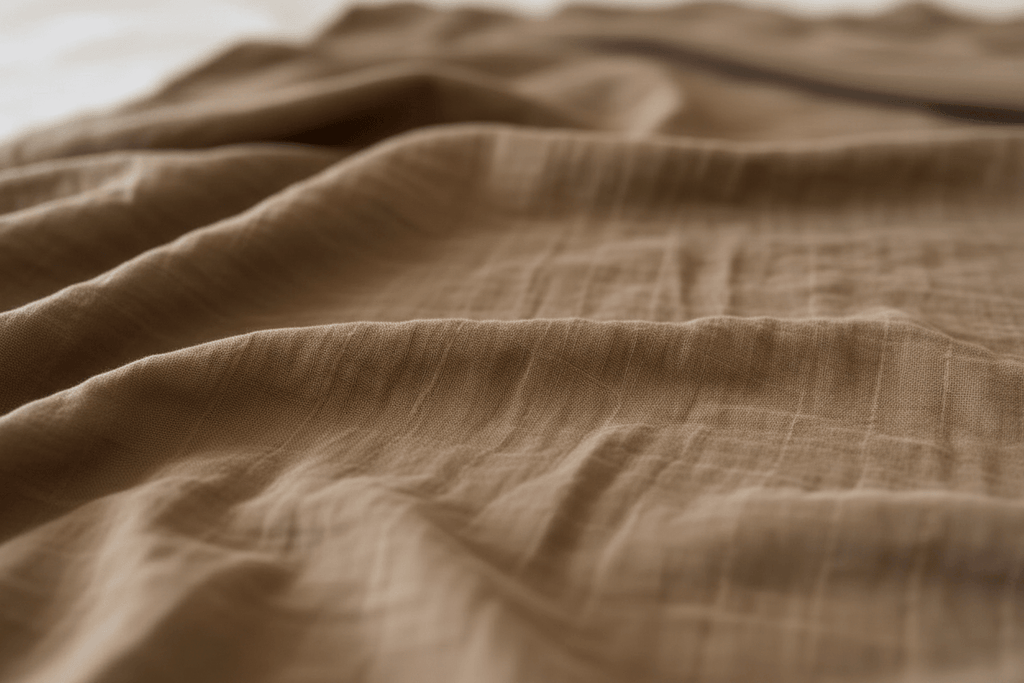 Essentīals Organic Muslin Swaddle - Soft & Versatile Dusty Brown